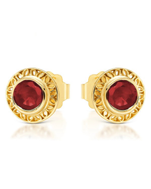 Lacy gold earrings with a red stone