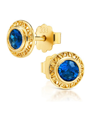 Lacy gold earrings with a blue stone