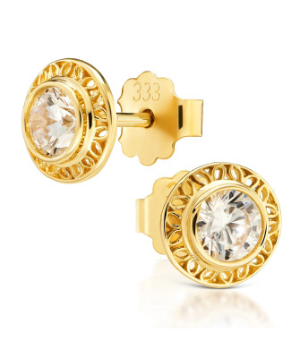 Lacy gold earrings with a white stone