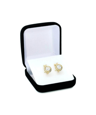 Lacy gold earrings with a white stone