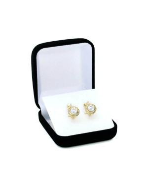 Lacy gold earrings with a white stone