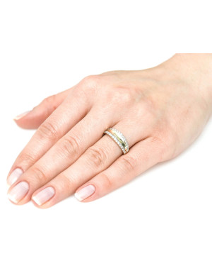 Wide gold ring like a wedding band with cubic zirconia