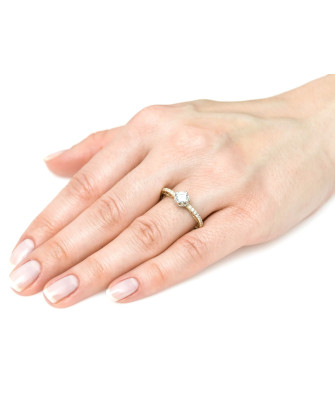 Gold filigree engagement ring with zirconia