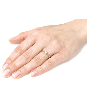 Delicate ring with a white stone