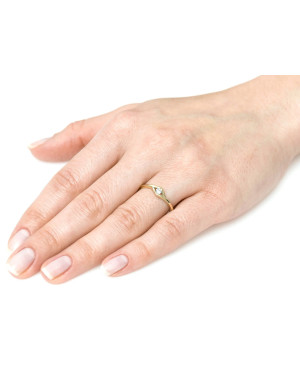 Delicate ring with a white stone