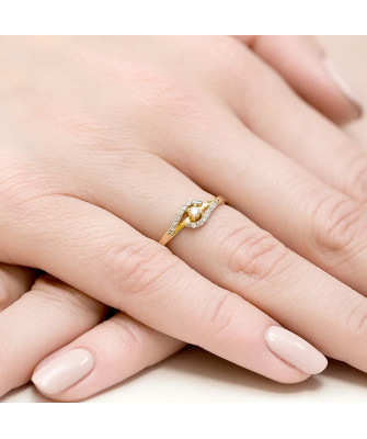 Złoty Pierścionek 14k z diamentem brylant 0,11ct
