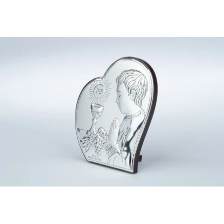 A communion souvenir for a boy with a picture of a silver heart