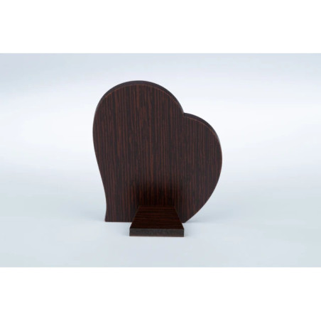 A communion souvenir for a boy with a picture of a silver heart