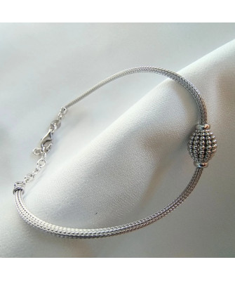 Silver bracelet with barrel