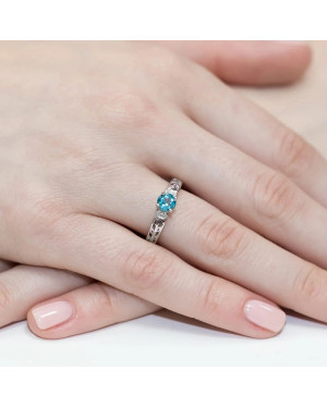 Gold ring with topaz white gold