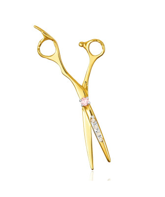 Golden scissors adorned with rhinestones