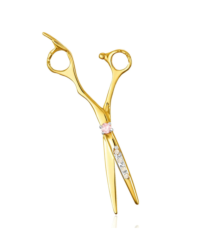 Golden scissors adorned with rhinestones