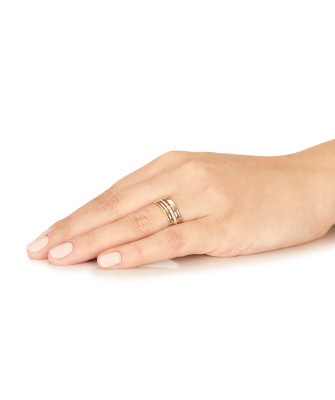 Wide gold ring with white stones