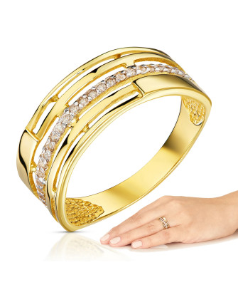 Wide gold ring with white stones