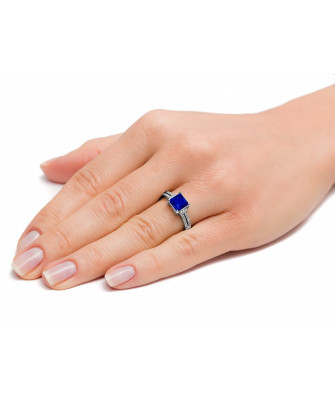 Silver ring with large blue stone