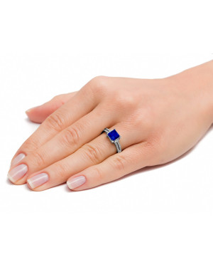 Silver ring with large blue stone