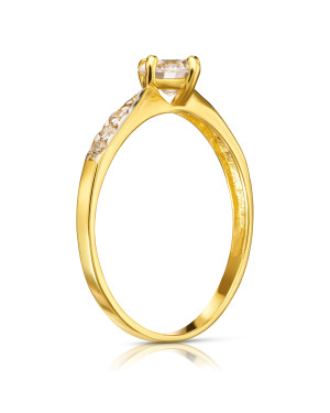 Gold engagement ring with a white stone