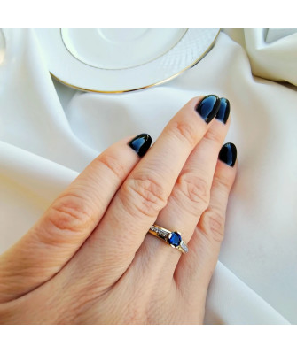 Ring with a blue stone 8k