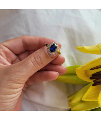 Ring with a large 8k blue stone