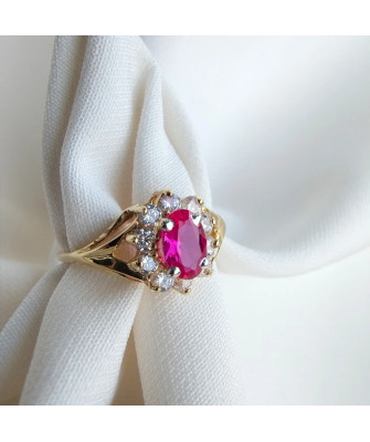 Marquise ring with a red stone