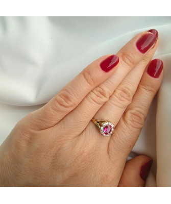 Marquise ring with a red stone