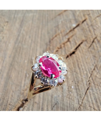 Marquise ring with a red stone