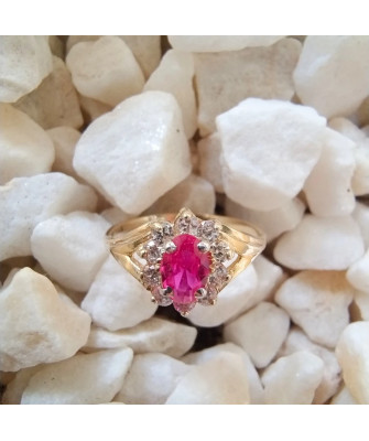 Marquise ring with a red stone