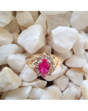 Marquise ring with a red stone