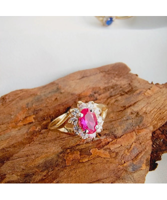 Marquise ring with a red stone