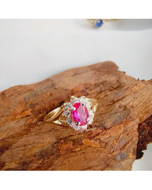 Marquise ring with a red stone