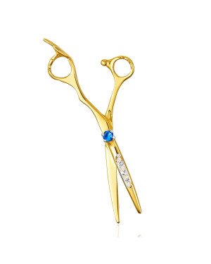 Golden scissors adorned with rhinestones