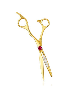 Golden scissors adorned with rhinestones