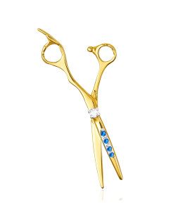 Golden scissors adorned with rhinestones