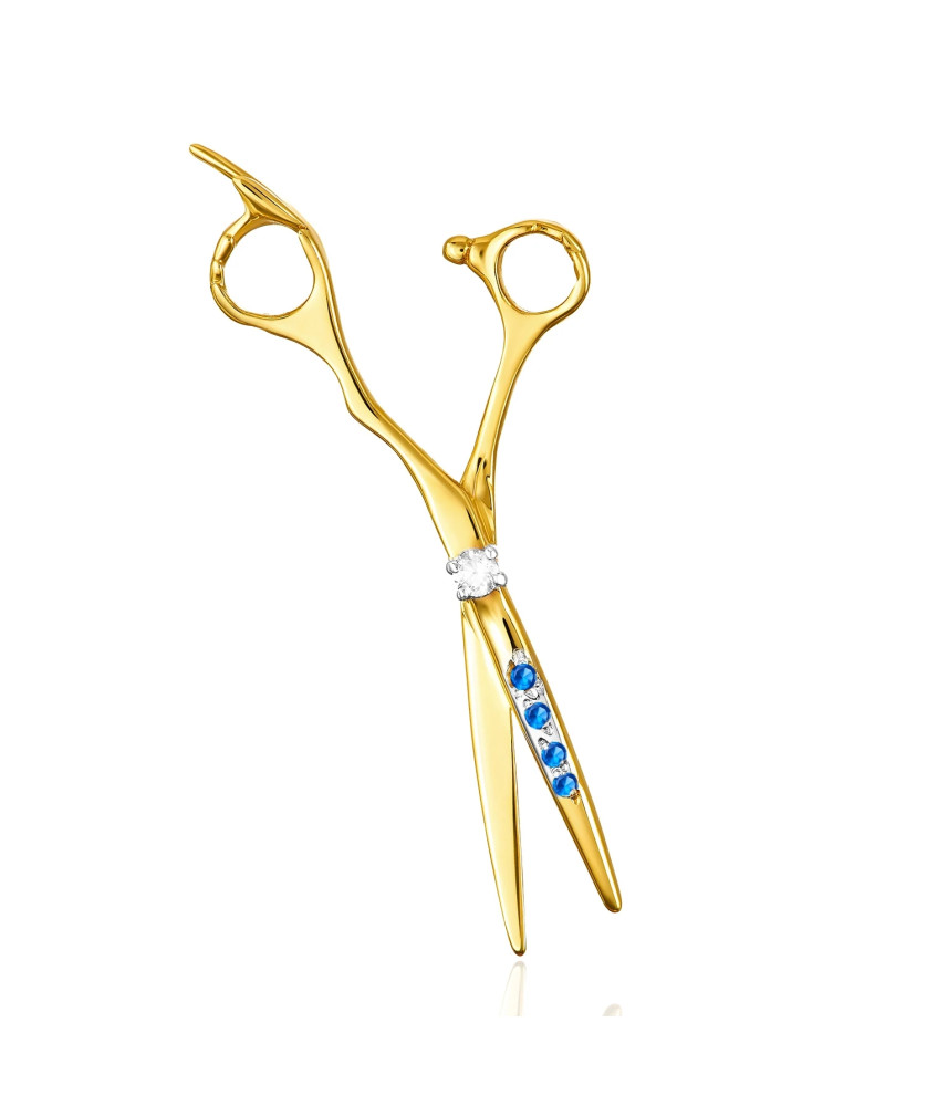 Golden scissors adorned with rhinestones