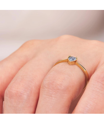Ring with a heart in the middle blue zirconia