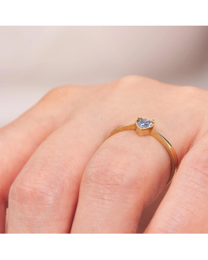 Ring with a heart in the middle blue zirconia
