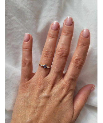 14k gold ring with a blue stone