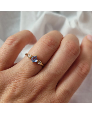 14k gold ring with a blue stone