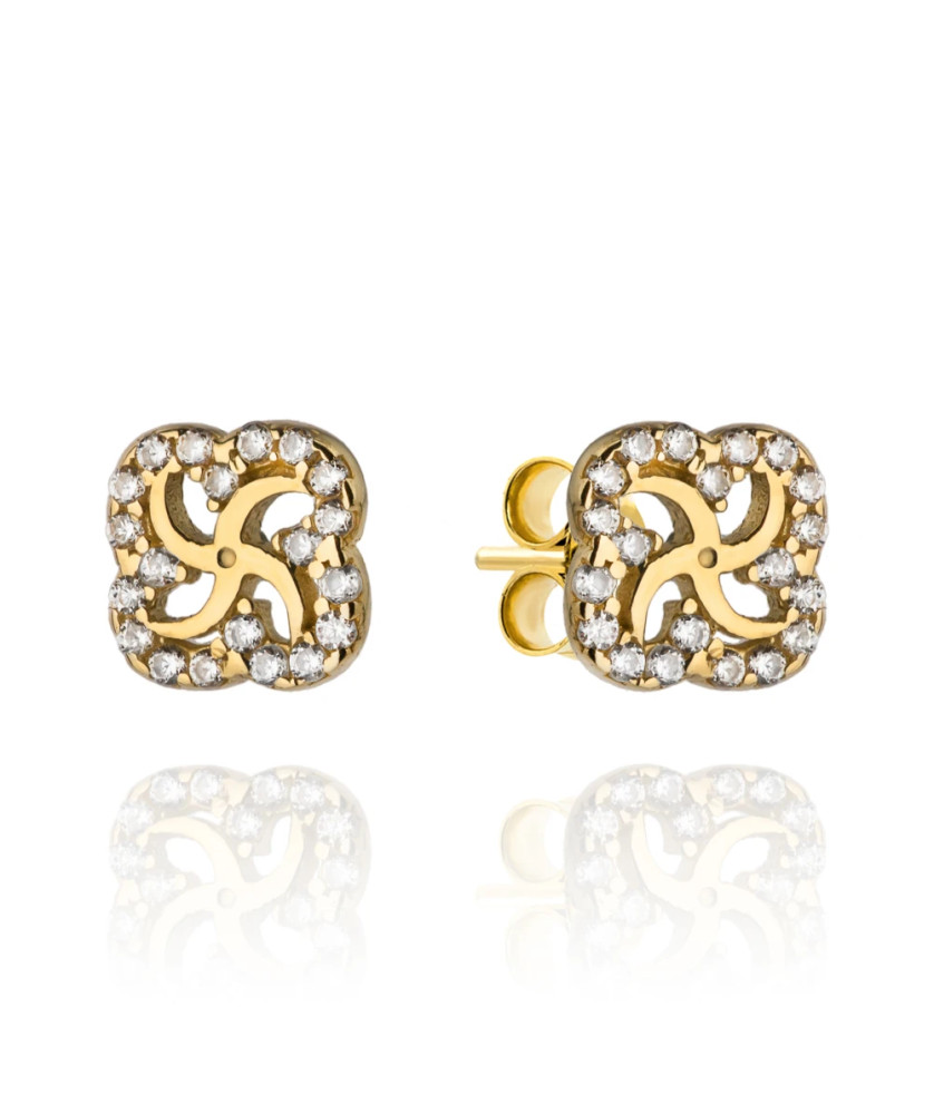 Gold earrings flower and around zirconia