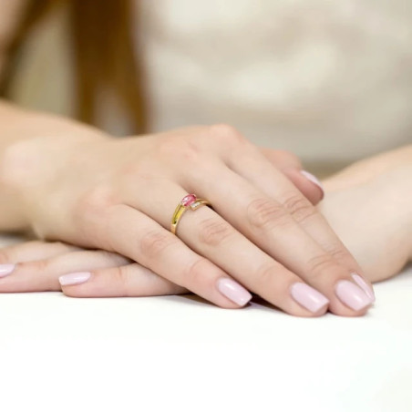 Ruby ring with gold diamonds