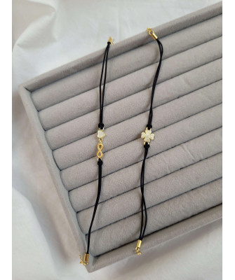 Gold-plated bracelet Black string CLOVER