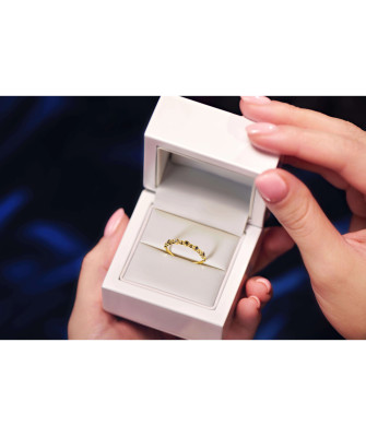 Thin golden ring black stones