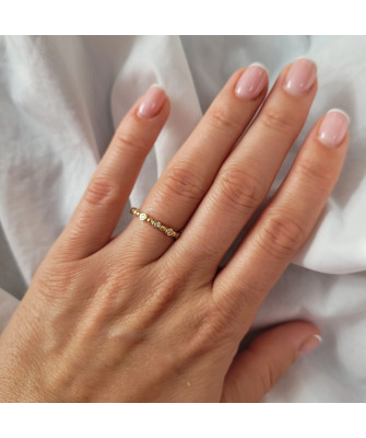 Thin golden ring white stones