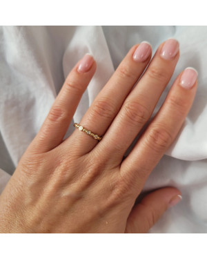 Thin golden ring white stones