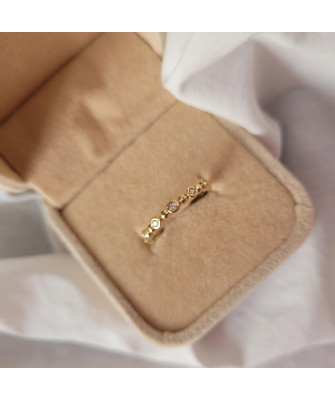 Thin golden ring white stones