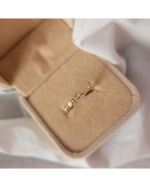 Thin golden ring white stones