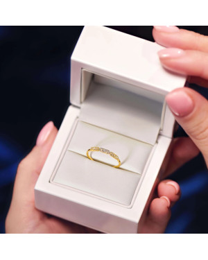 Gold ring white stones