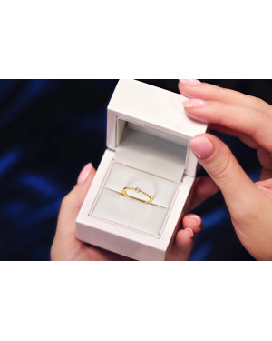 Delicate gold ring white stones