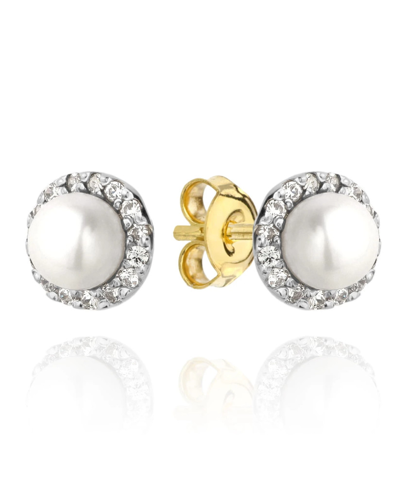 Gold earrings with a pearl surrounded by zircons