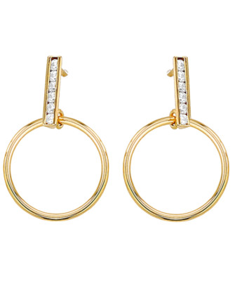 Gold hoop earrings suspended on a rod with zircons